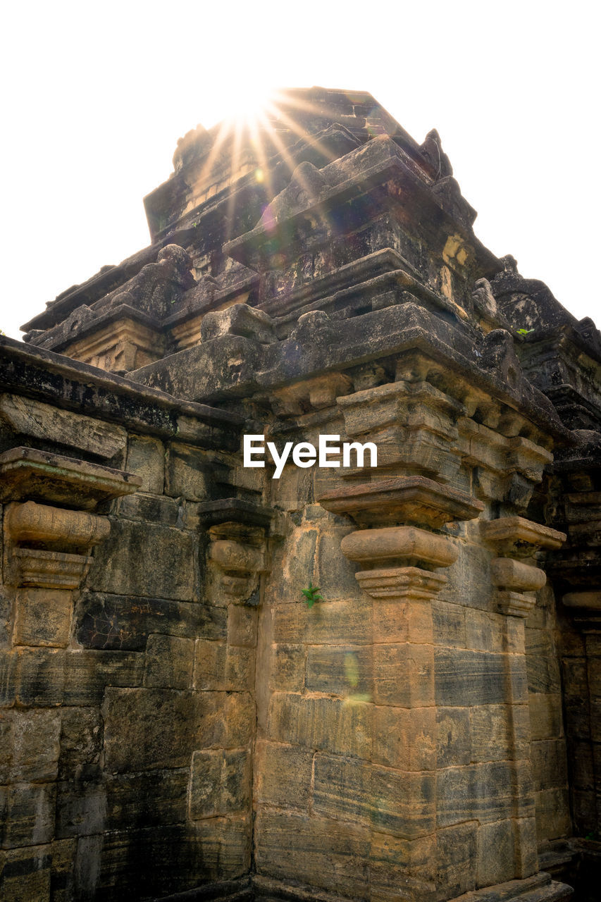 Low angle view of old ruins against clear sky