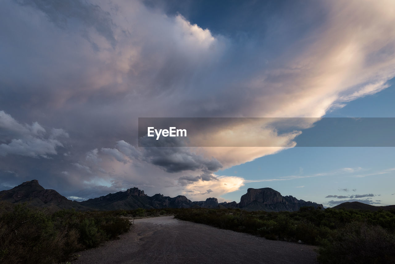 Empty road against sky during sunset in big bend national park - texas