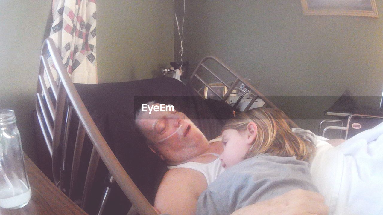 WOMAN SLEEPING ON BED