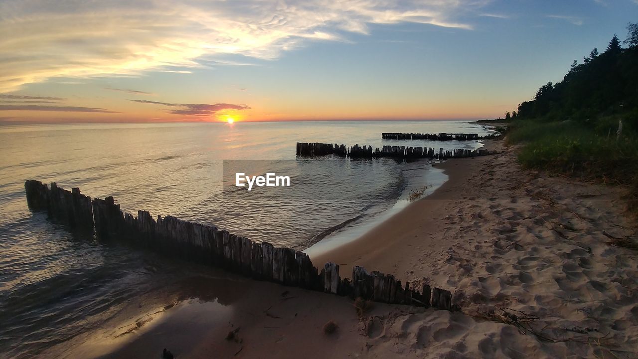 Scenic view of beach during sunset