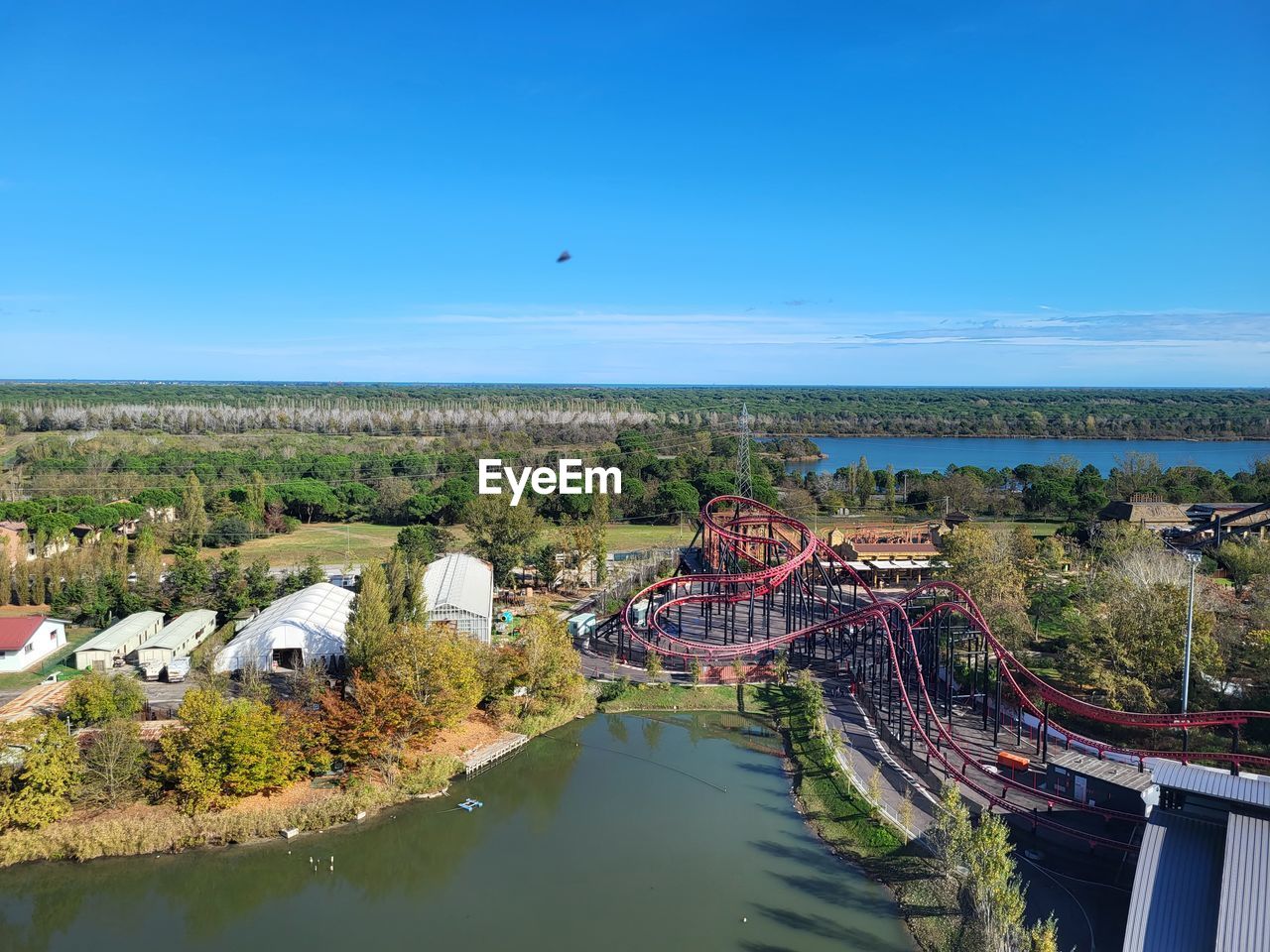 water, sky, architecture, nature, built structure, aerial photography, sea, coast, building exterior, travel destinations, blue, vacation, transportation, building, day, landscape, environment, no people, plant, travel, flying, clear sky, scenics - nature, tourism, outdoors, city, land, tree, sunny, bay, beauty in nature, high angle view, animal, horizon, body of water, horizon over water, shore, animal themes, beach, mode of transportation