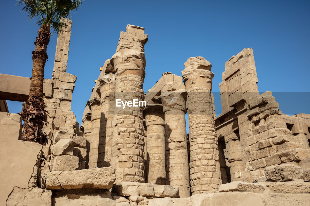 Different hieroglyphs on the walls and columns in the karnak temple.