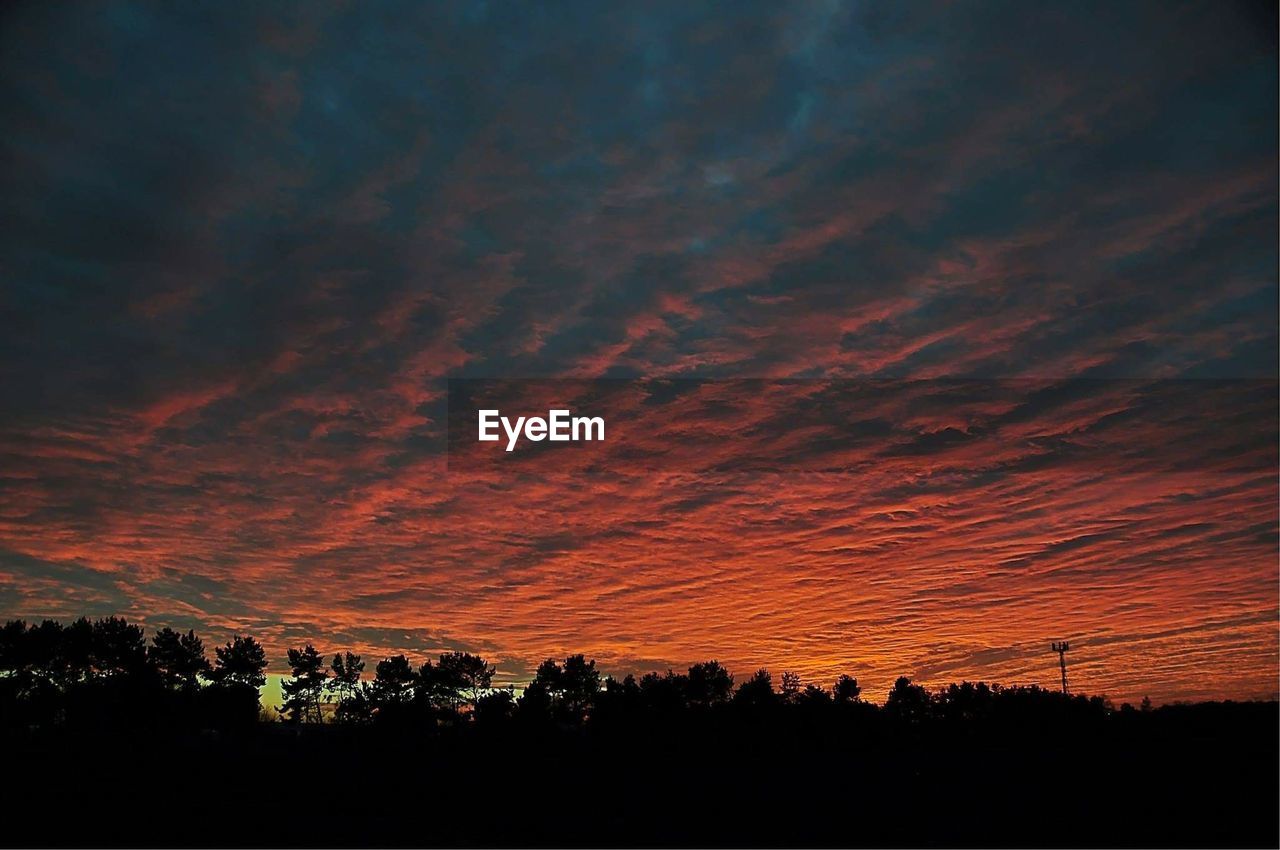 SILHOUETTE OF LANDSCAPE DURING SUNSET