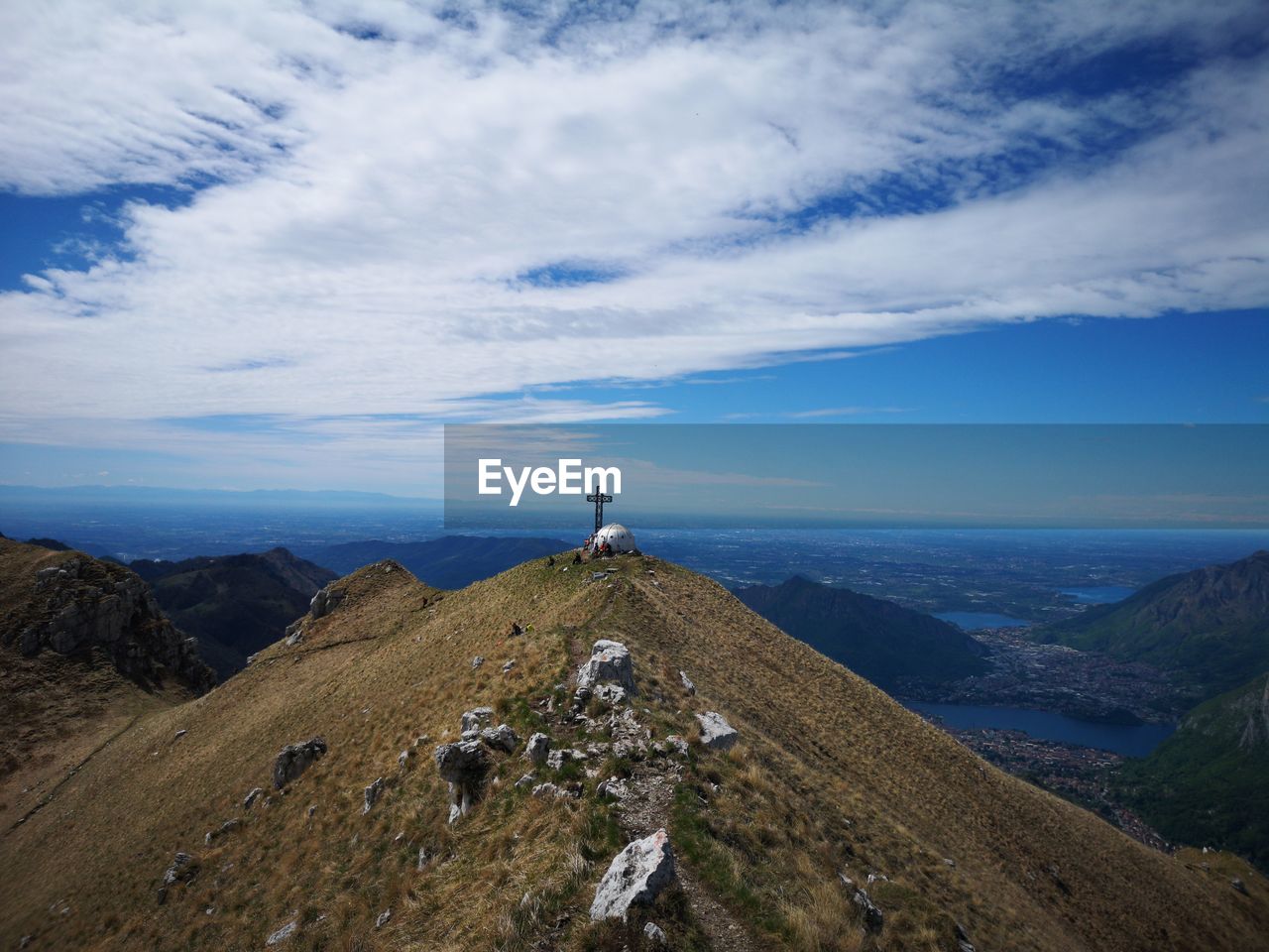 Scenic view of landscape and mountains against sky