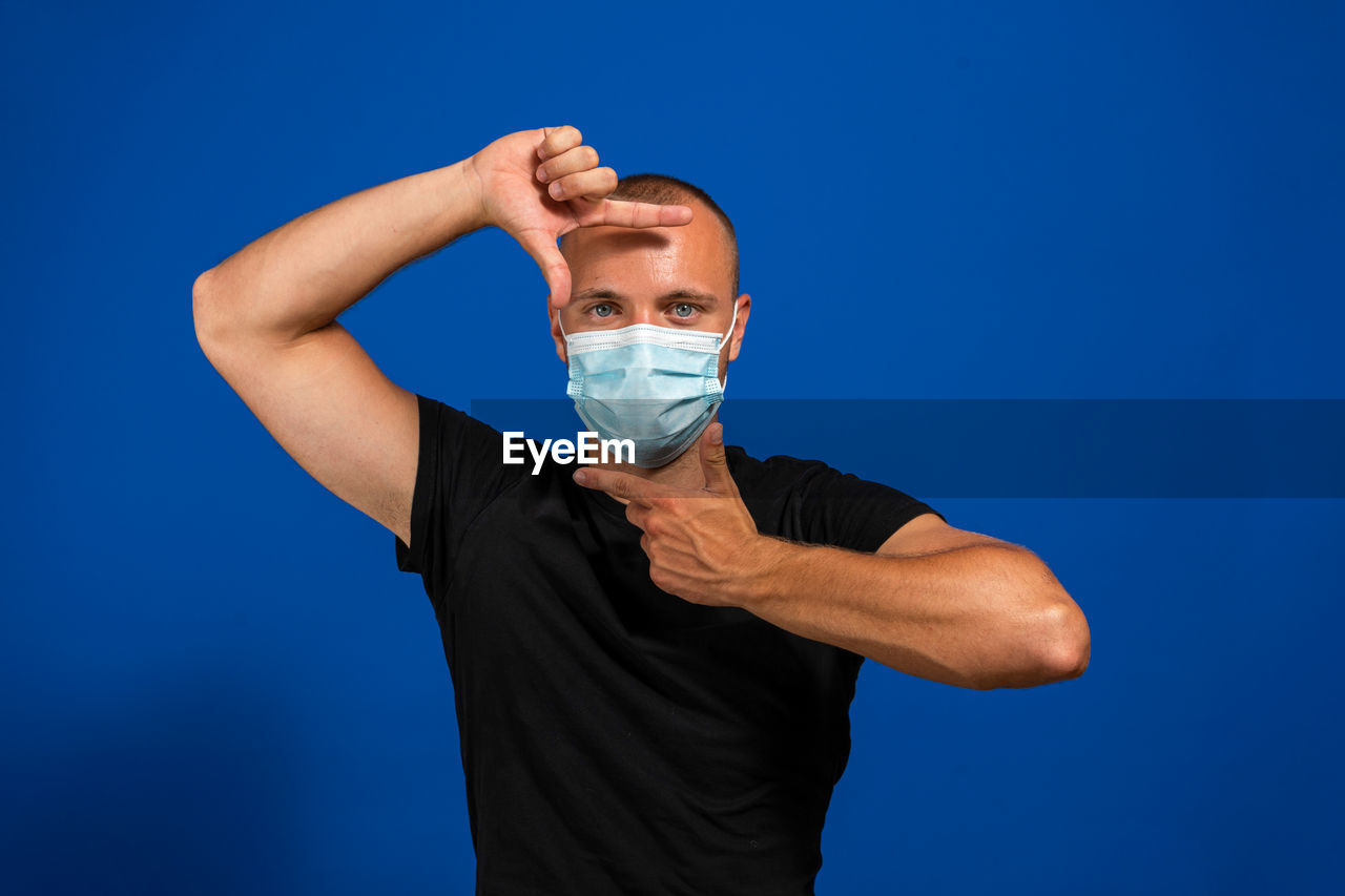 PORTRAIT OF A YOUNG MAN WITH BLUE EYES