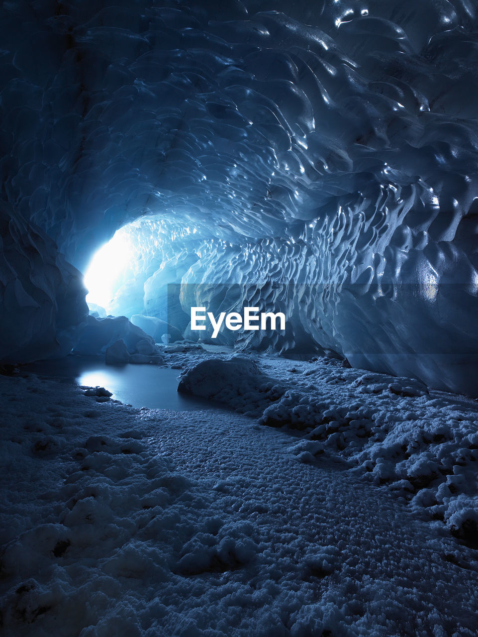 Light streaming into an ice cave in iceland