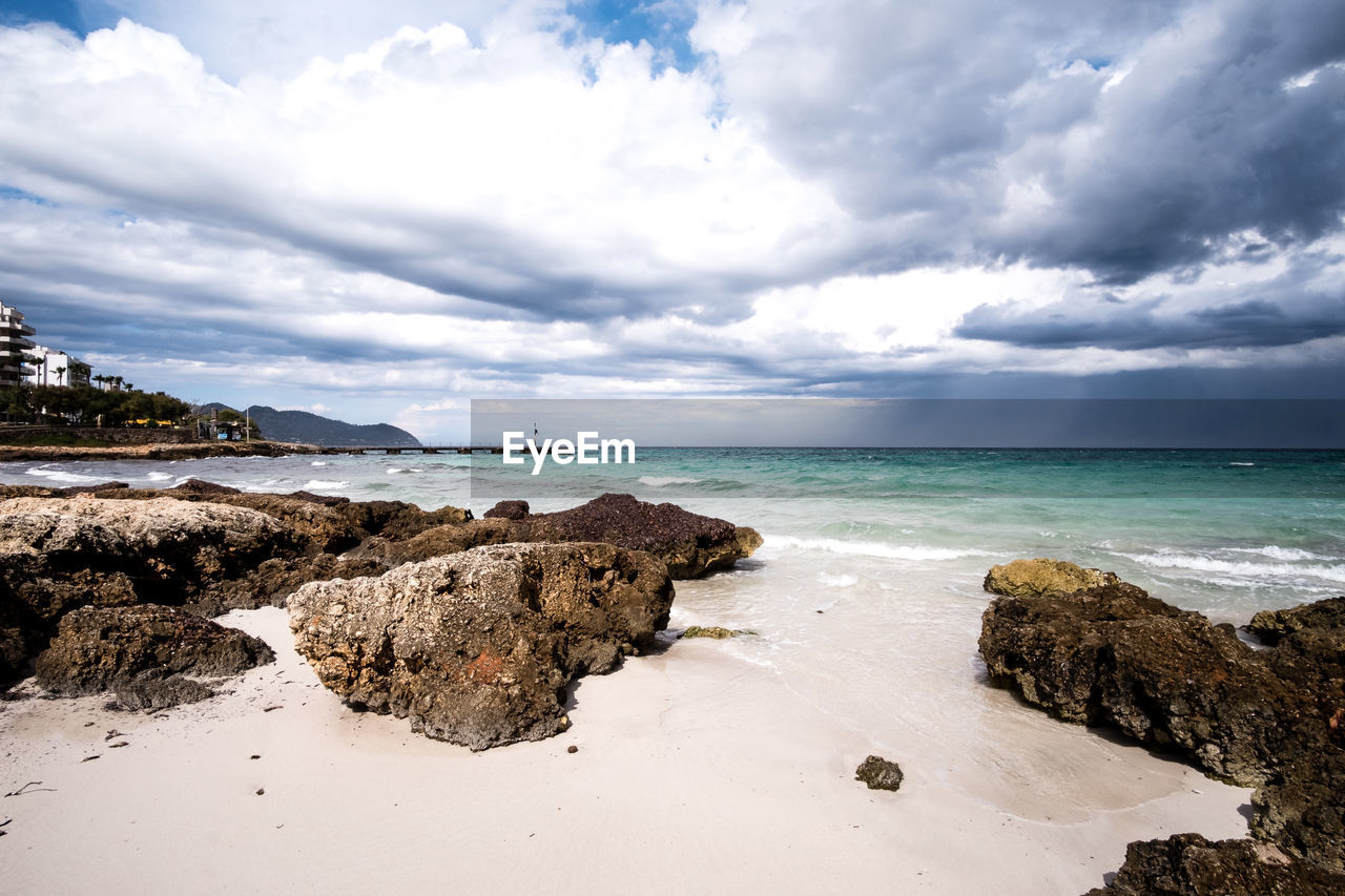 Scenic view of beach against sky
