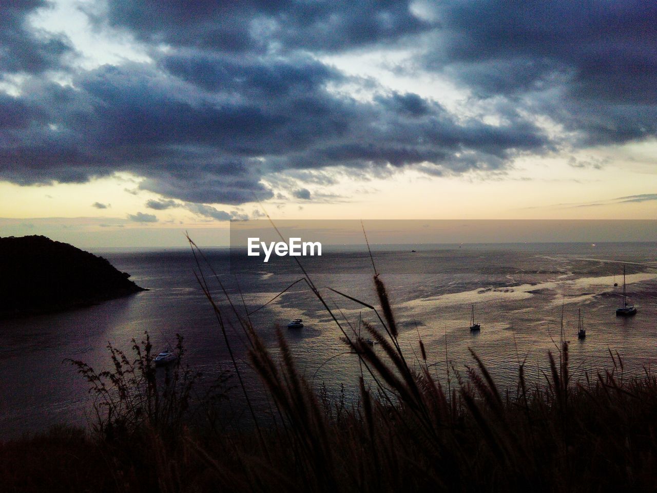 SCENIC VIEW OF SEA DURING SUNSET