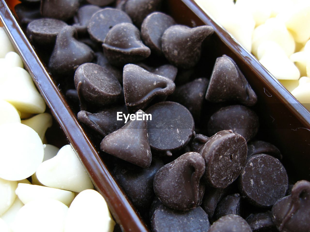 Close-up of chocolate chips in container