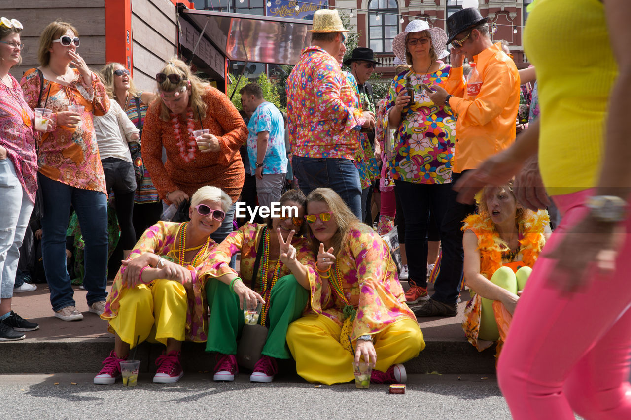 GROUP OF PEOPLE IN THE MARKET