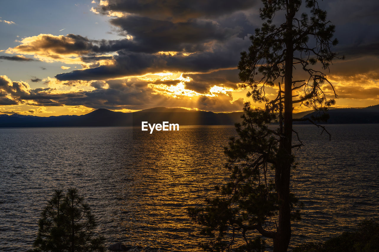 scenic view of sea against sky at sunset