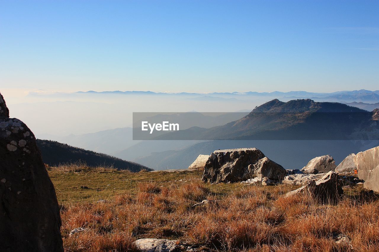 Scenic view of mountains against clear sky