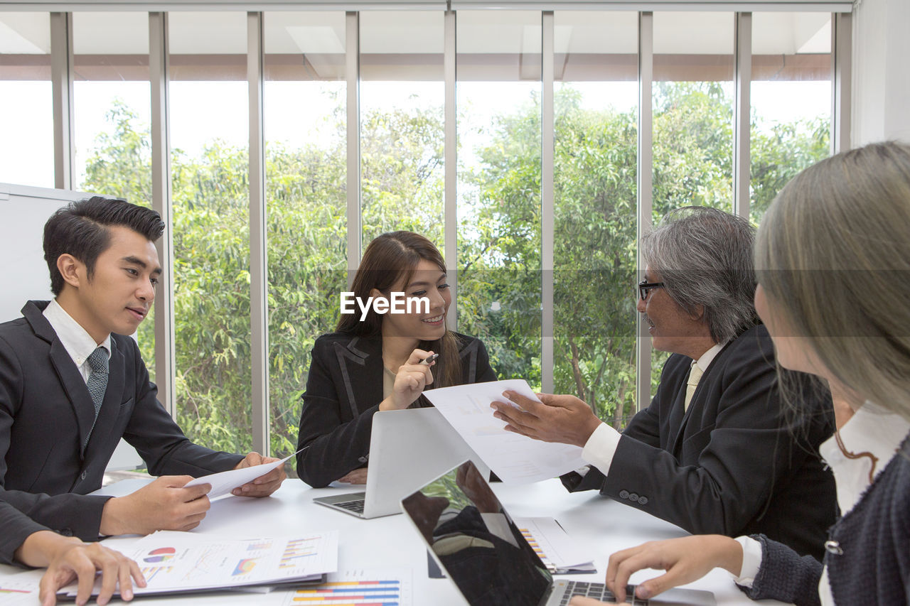 Business people working at desk in office