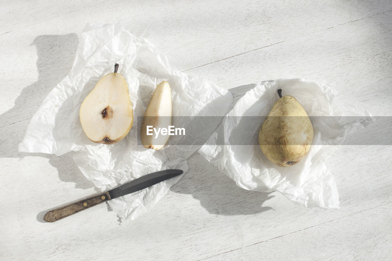 Overhead view of pears on wooden table