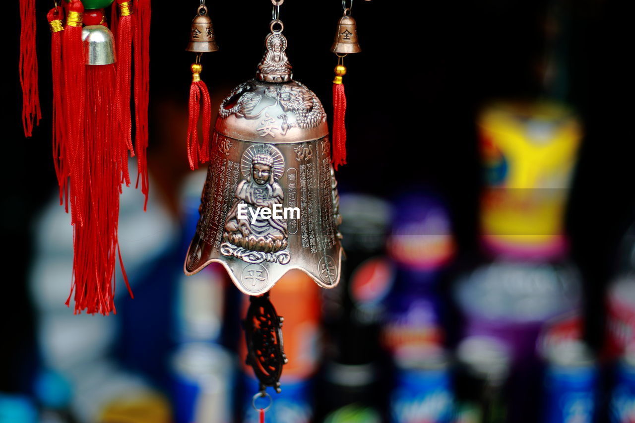 Close-up of prayer bell hanging