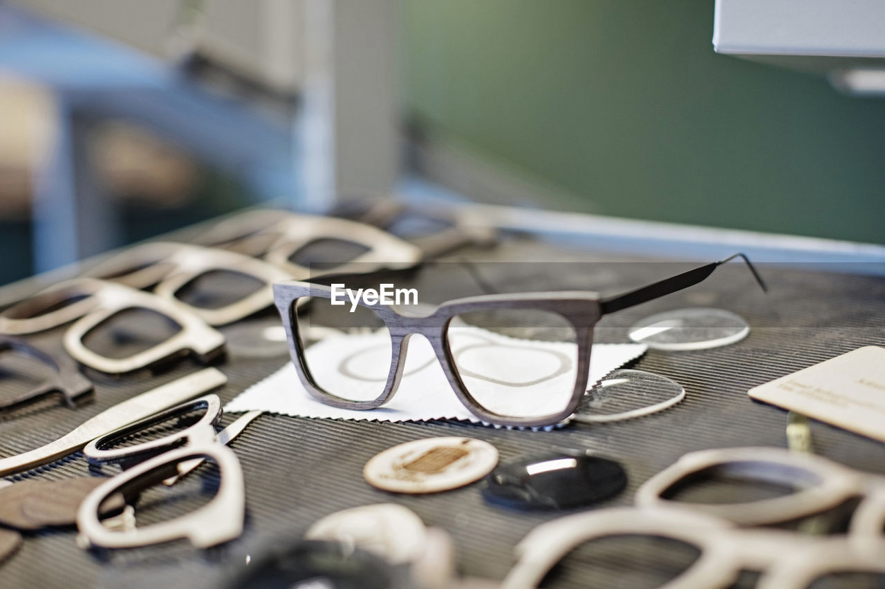 Eyeglasses frames on table at workshop