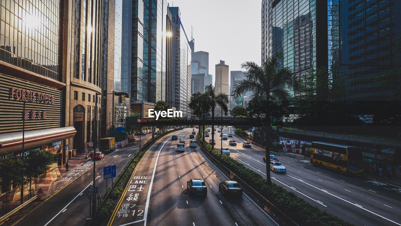 Road amidst buildings in city