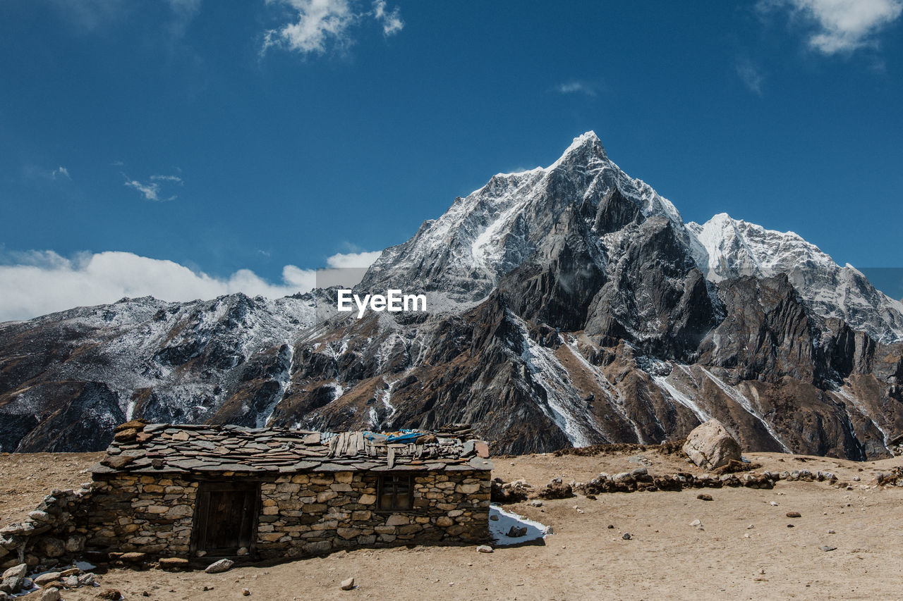 Mountain landscape with a house in the foreground, himalayas, nepal