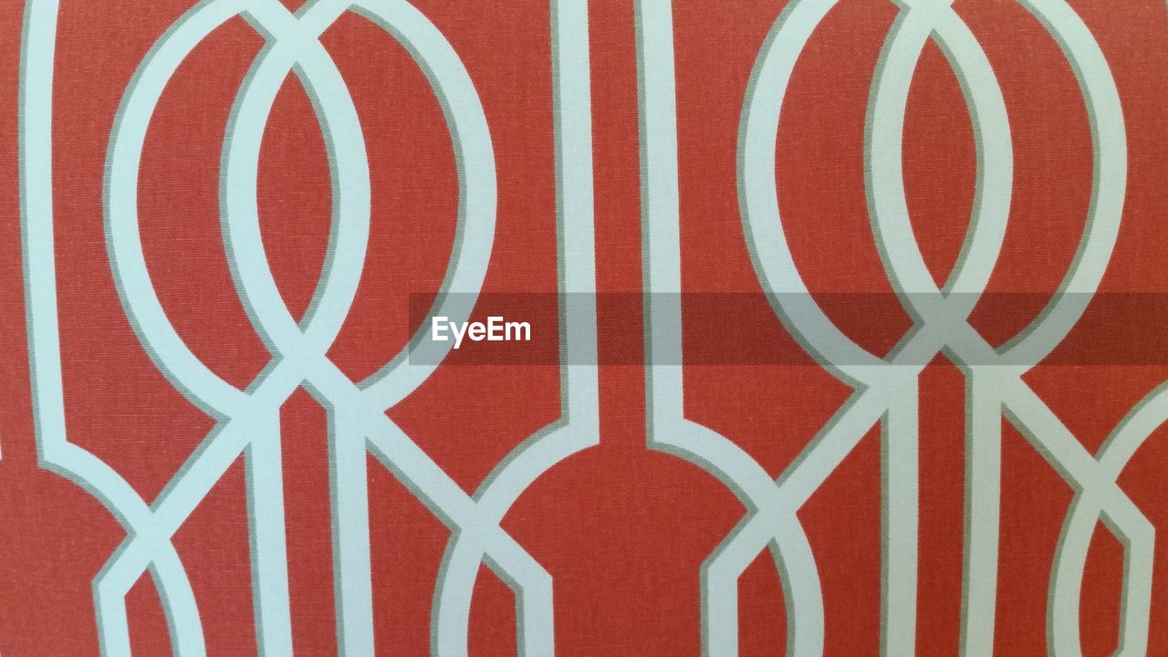 FULL FRAME SHOT OF RED PATTERN ON WALL