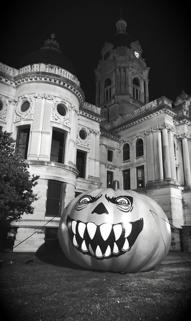 Inflatable pumpkin against old vanderburgh county courthouse