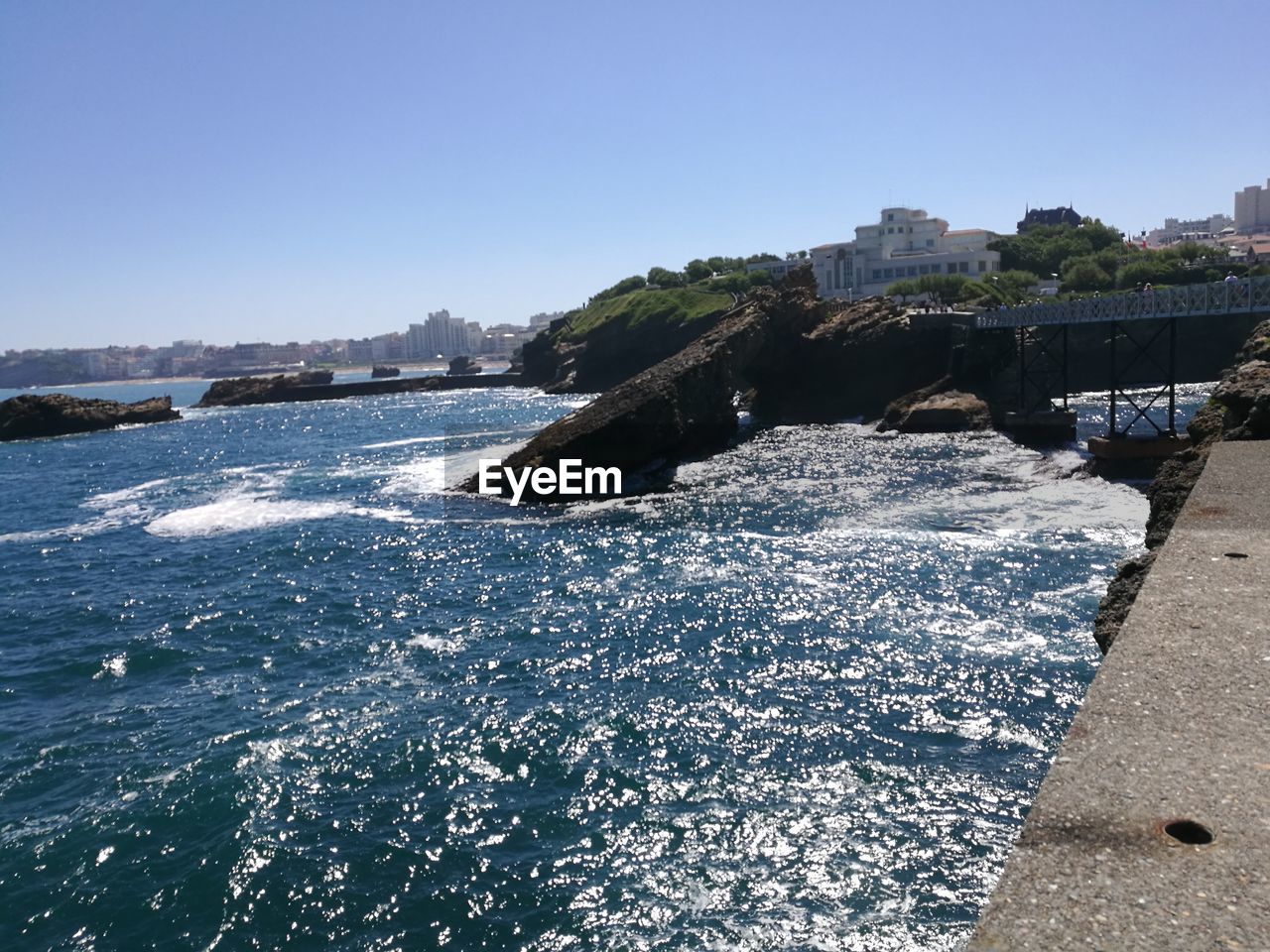 Scenic view of sea against clear sky