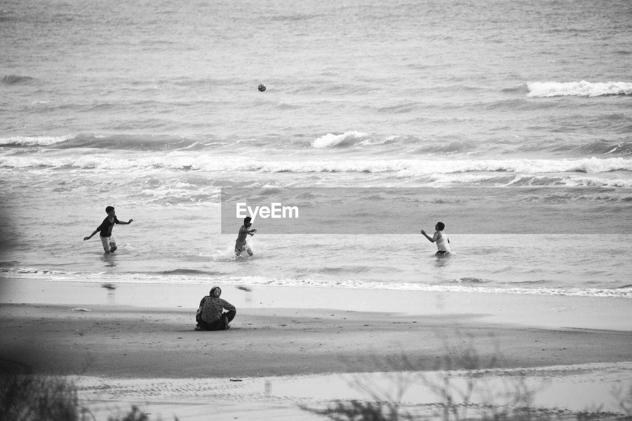 Boys playing at beach