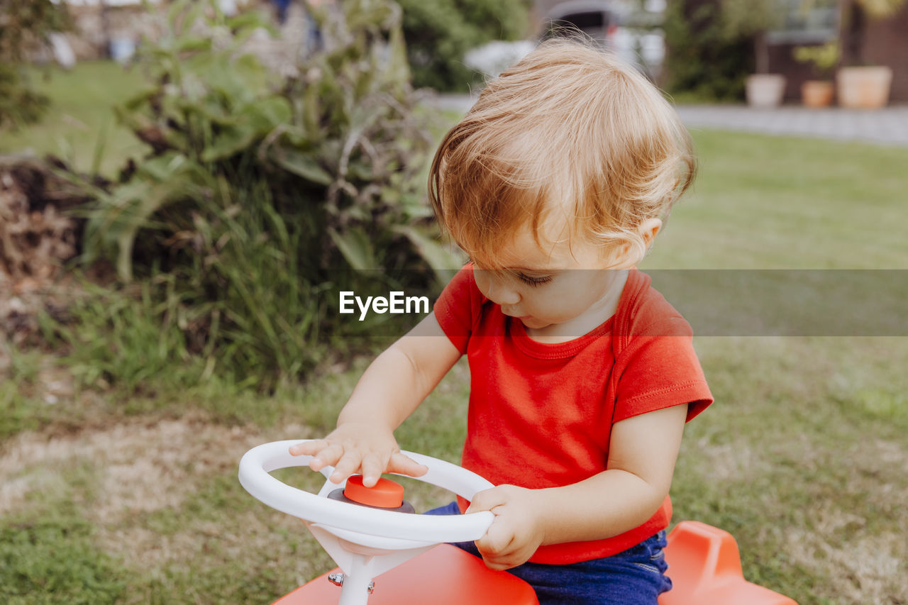 Cute girl playing in backyard