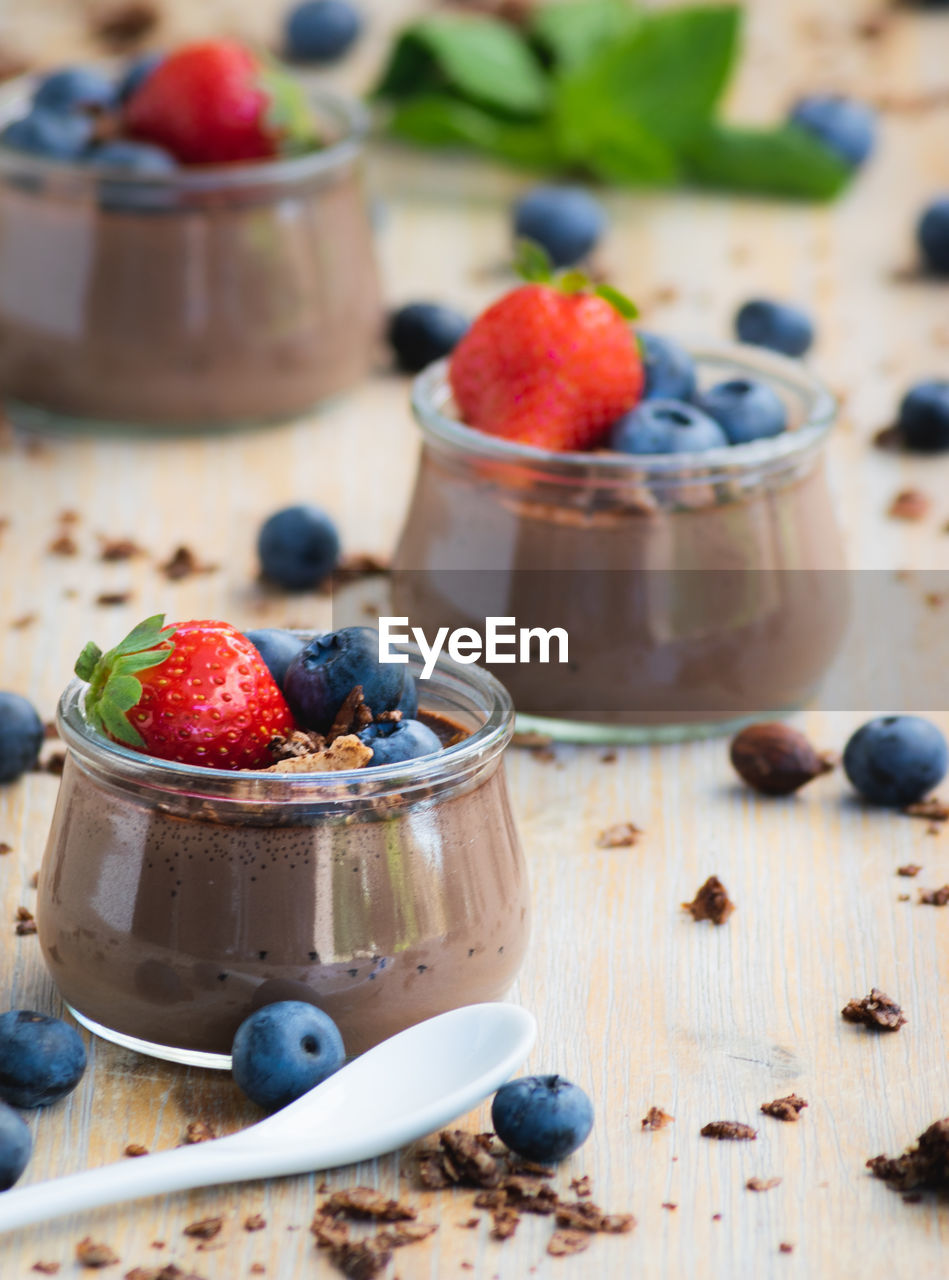 Chocolate dessert with strawberries and blueberries