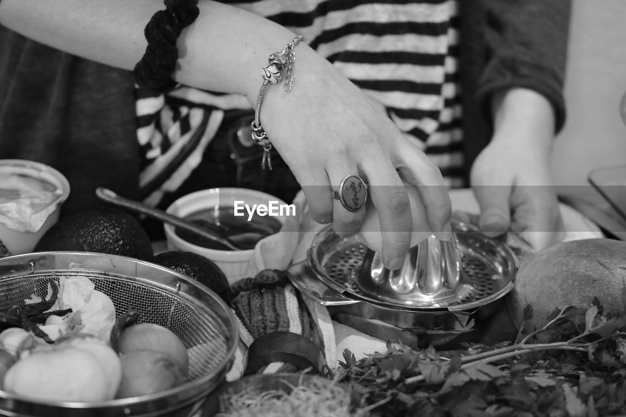 PEOPLE PREPARING FOOD