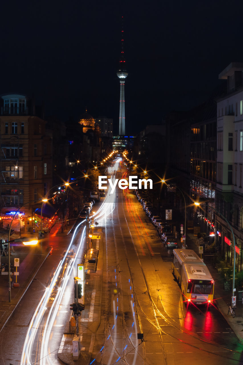 High angle view of road leading towards fernsehturm tower at night