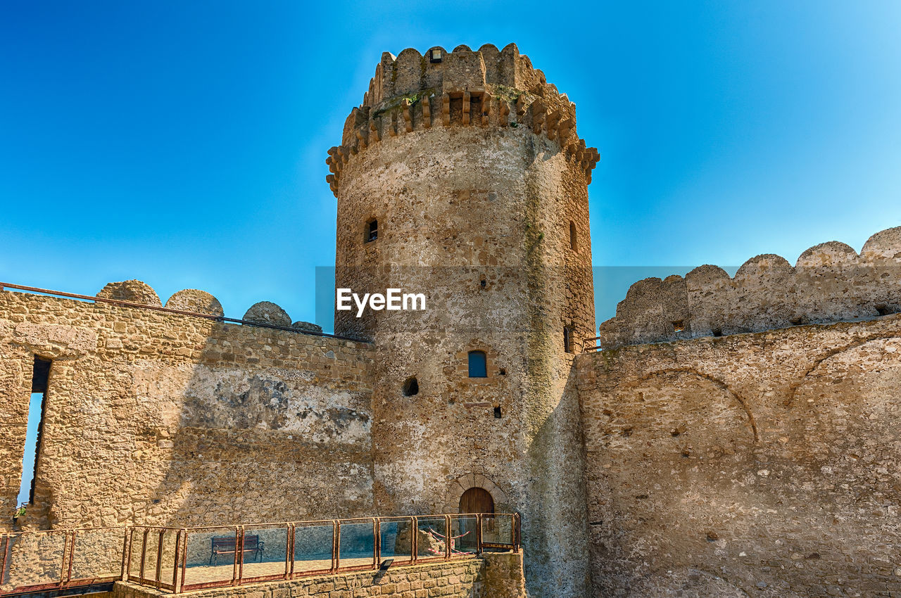 View of aragonese castle, aka le castella, on the ionian sea, town of isola capo rizzuto, italy