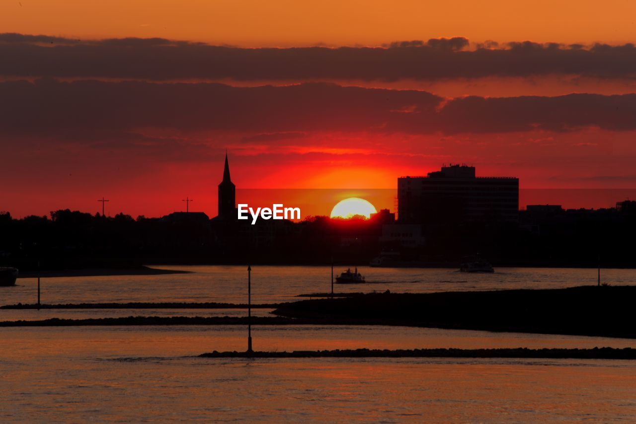 Silhouette of buildings during sunset