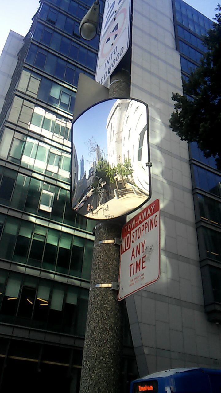 LOW ANGLE VIEW OF MODERN BUILDINGS