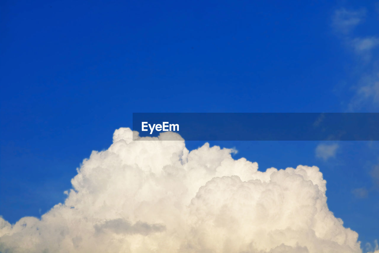 Low angle view of clouds in blue sky