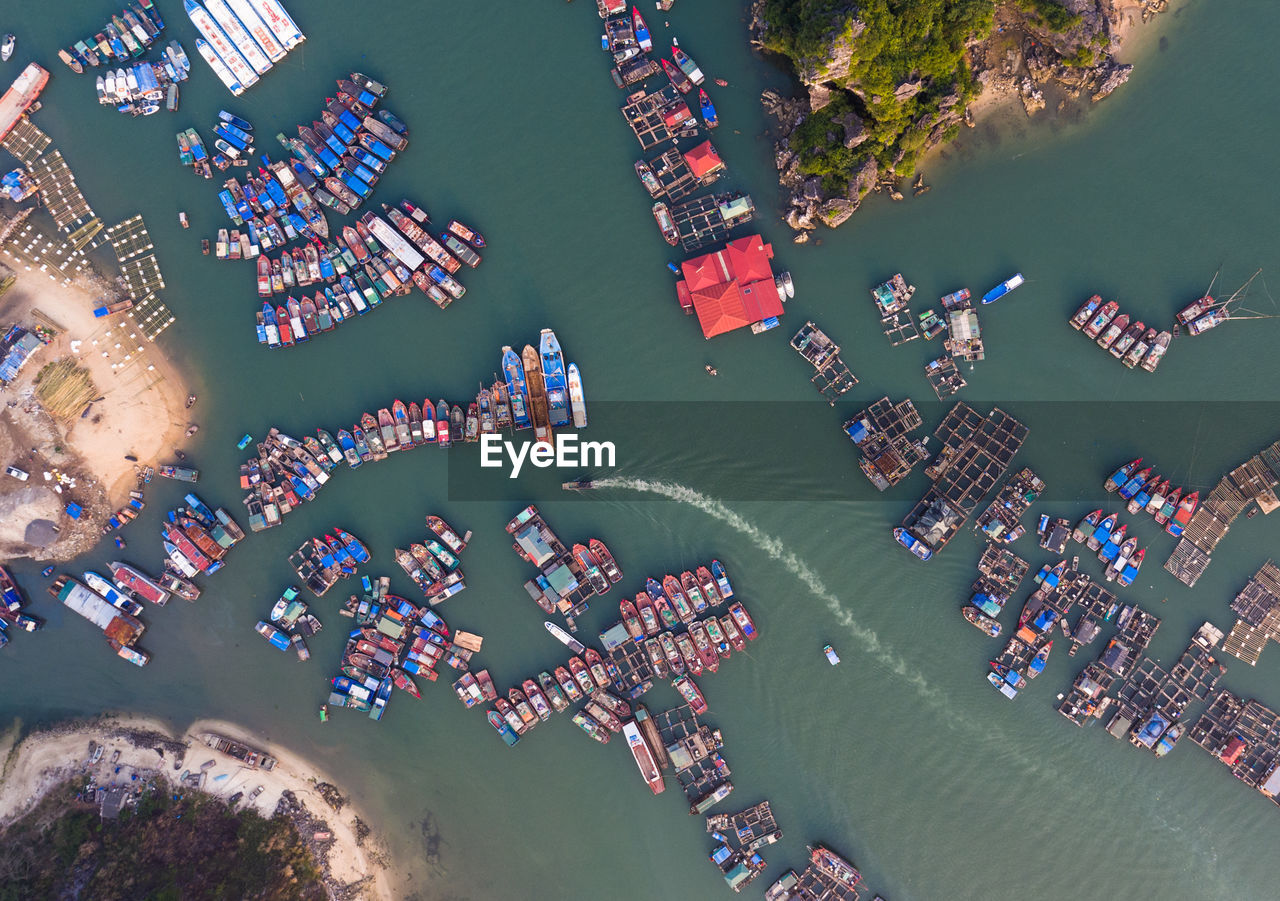 Aerial view of boats moored on sea