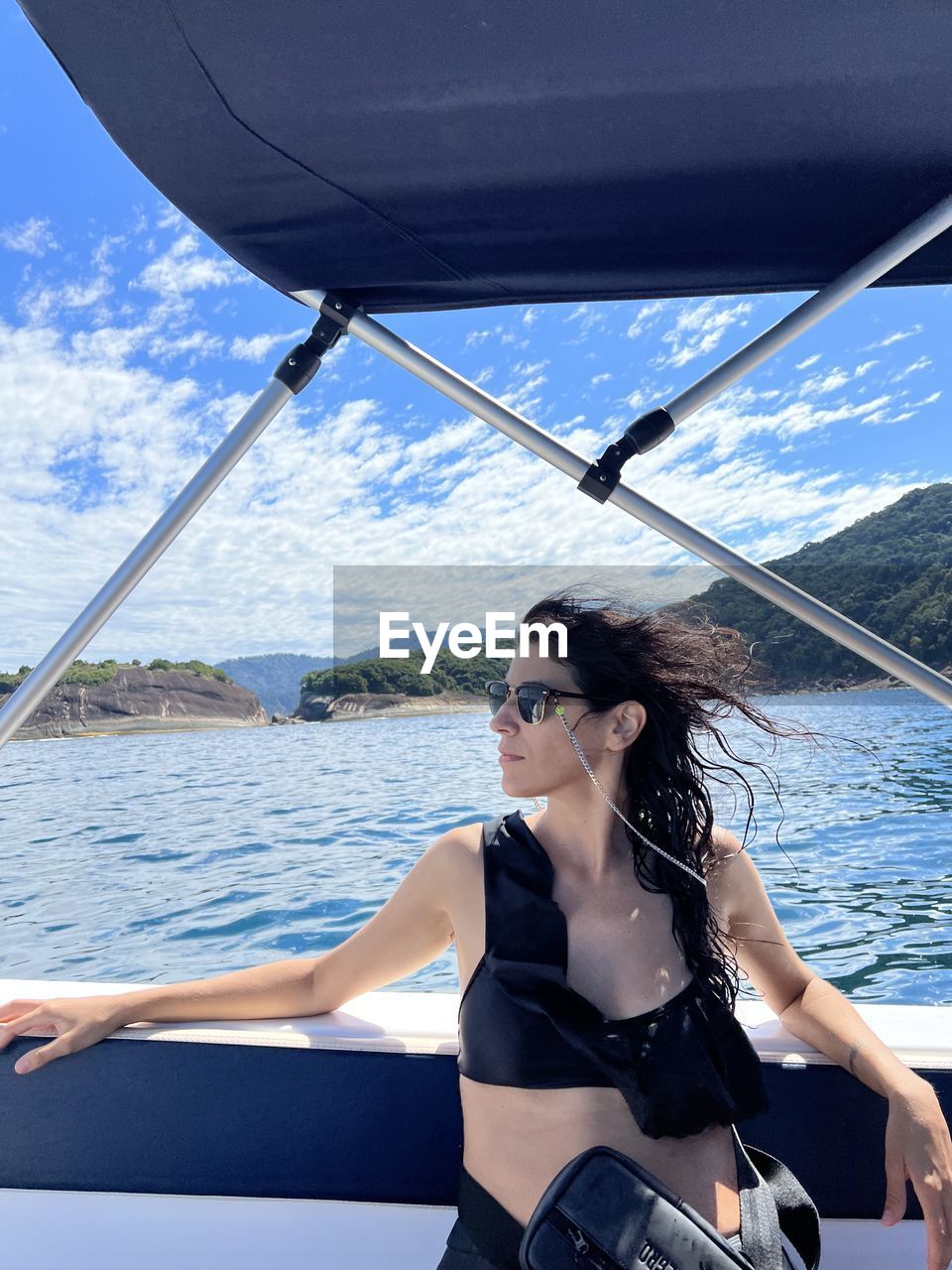High angle view of woman on a yacht in a sea excursion 