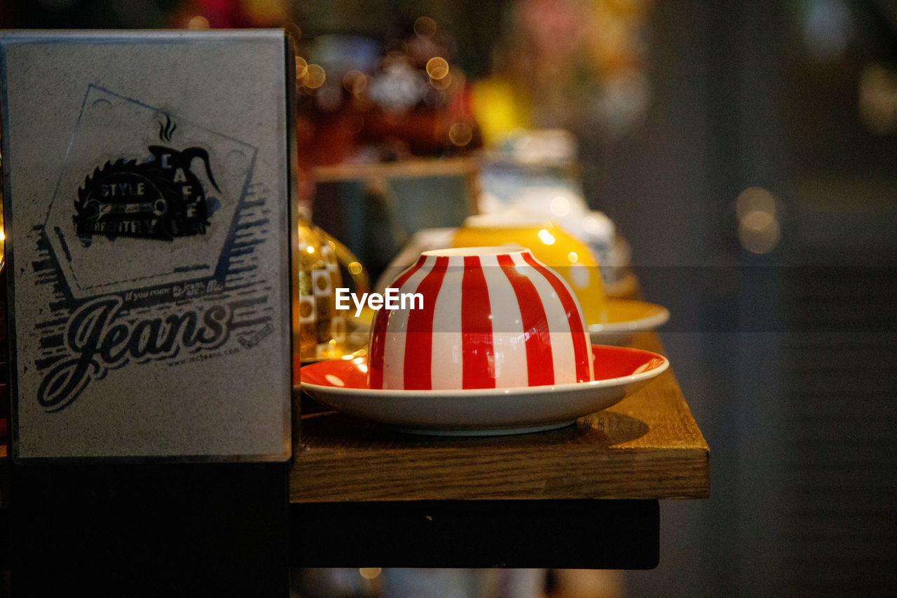 Close-up of coffee  mugs on table in restaurant