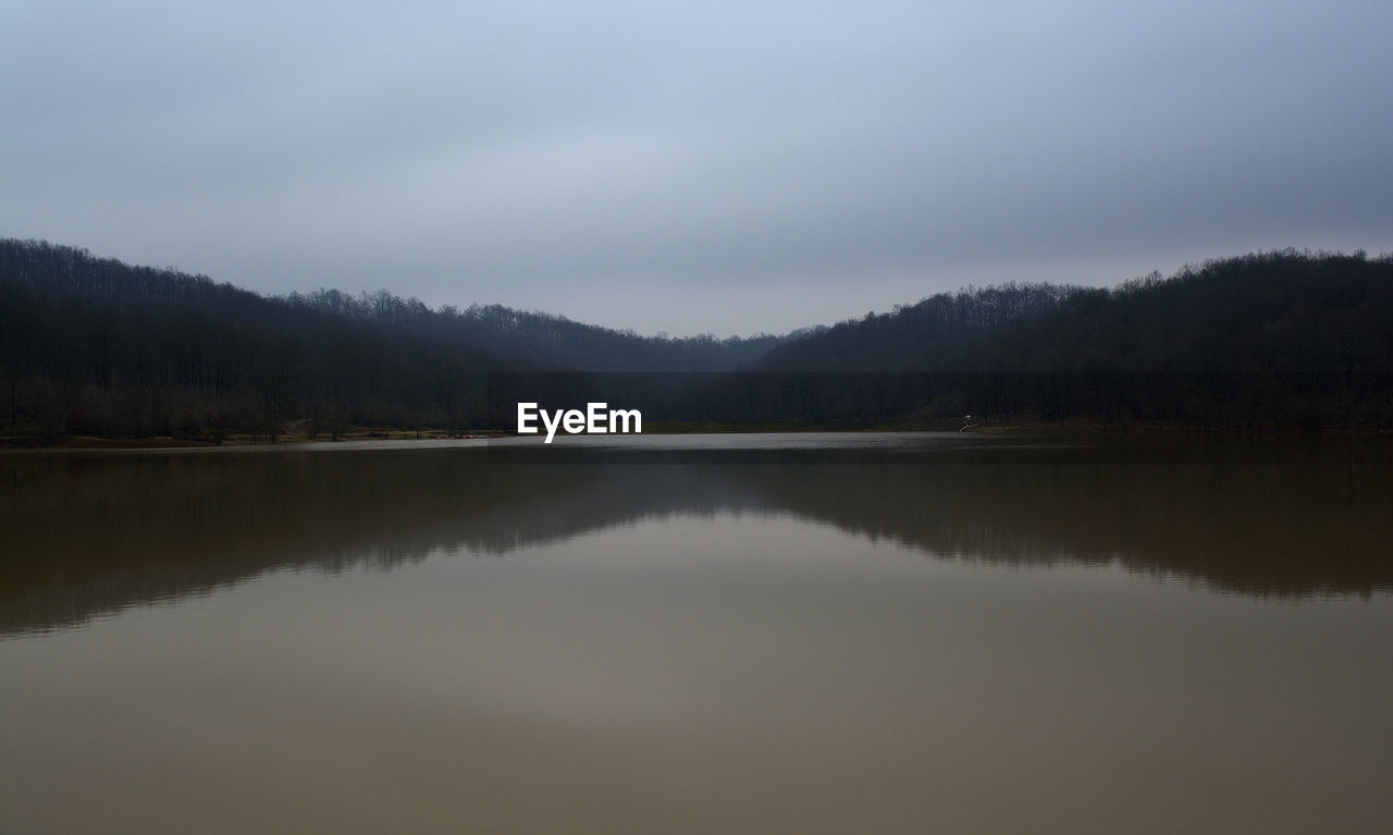 REFLECTION OF CLOUDS IN WATER