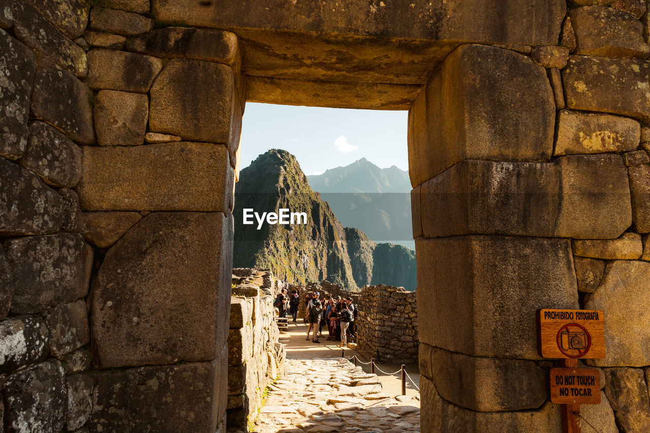 Machu picchu old inca ruins at sunrise in peru