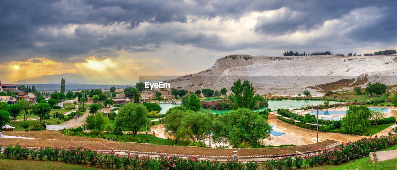 PANORAMIC VIEW OF TREES AND LANDSCAPE AGAINST SKY