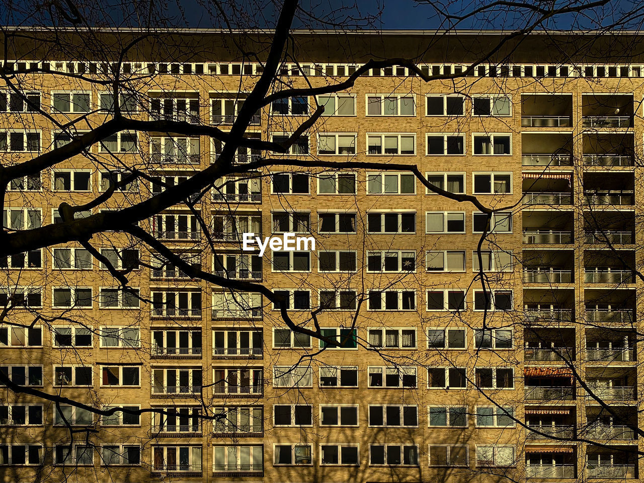 LOW ANGLE VIEW OF RESIDENTIAL BUILDING