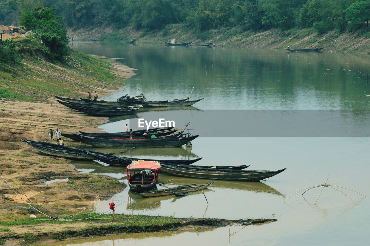 Fishing boat moored on lake