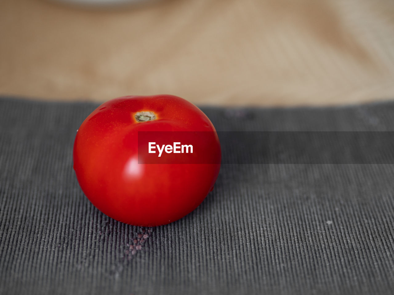 Close up of simple tomato on the table