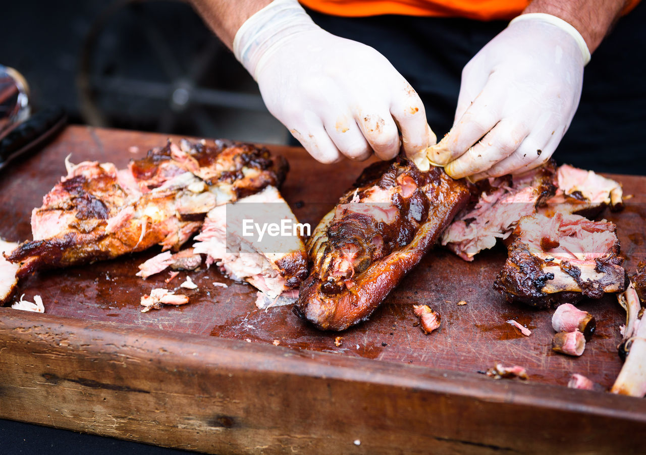 Cropped image of chef preparing food