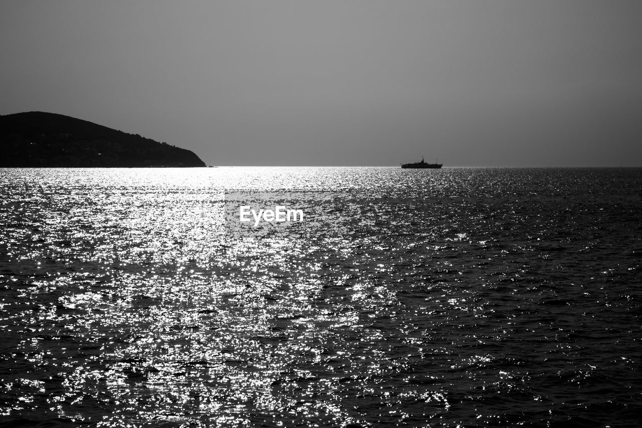 Scenic view of sea against clear sky