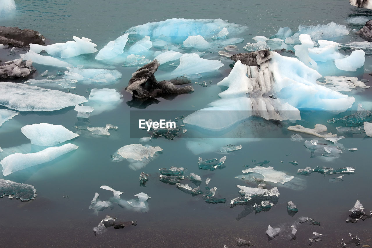 AERIAL VIEW OF FROZEN LAKE WITH ICE