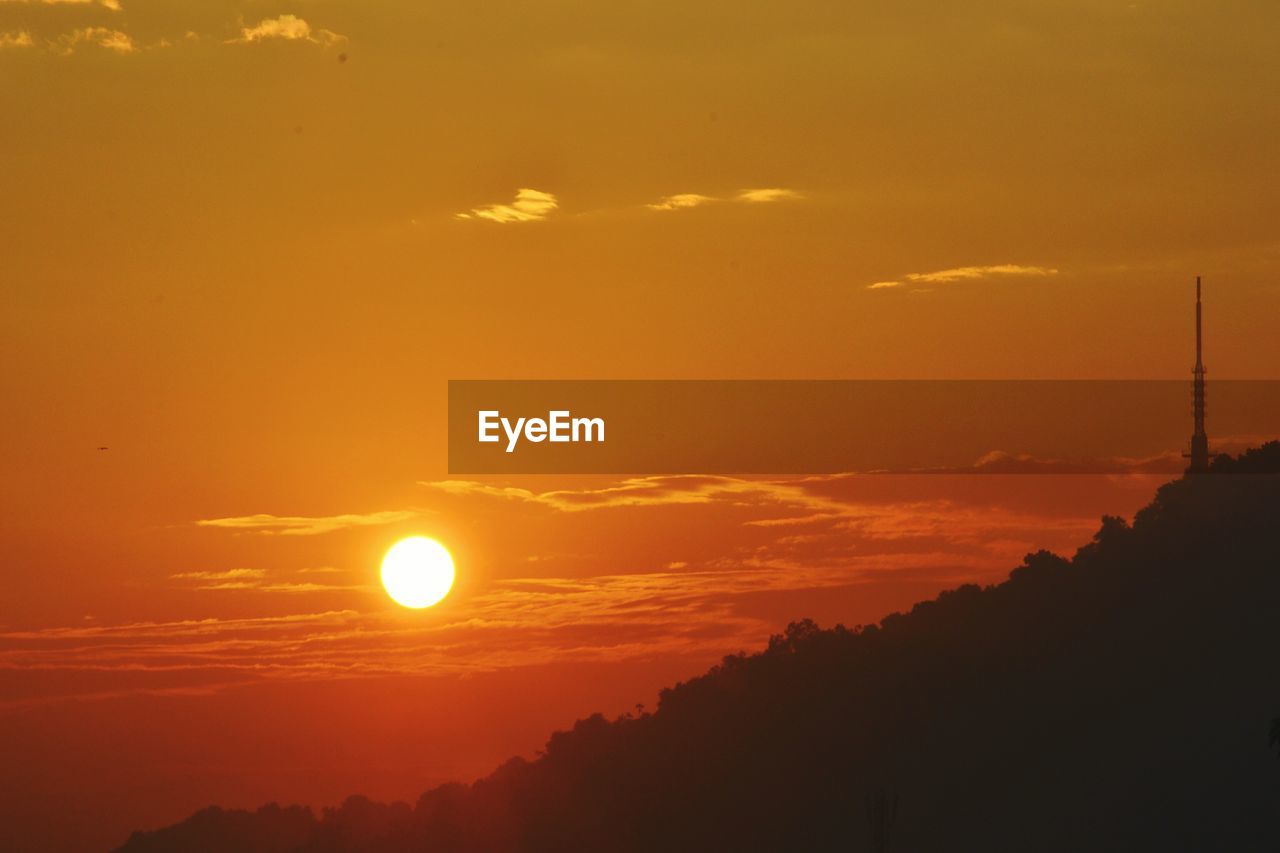 SCENIC VIEW OF SUNSET AGAINST SKY