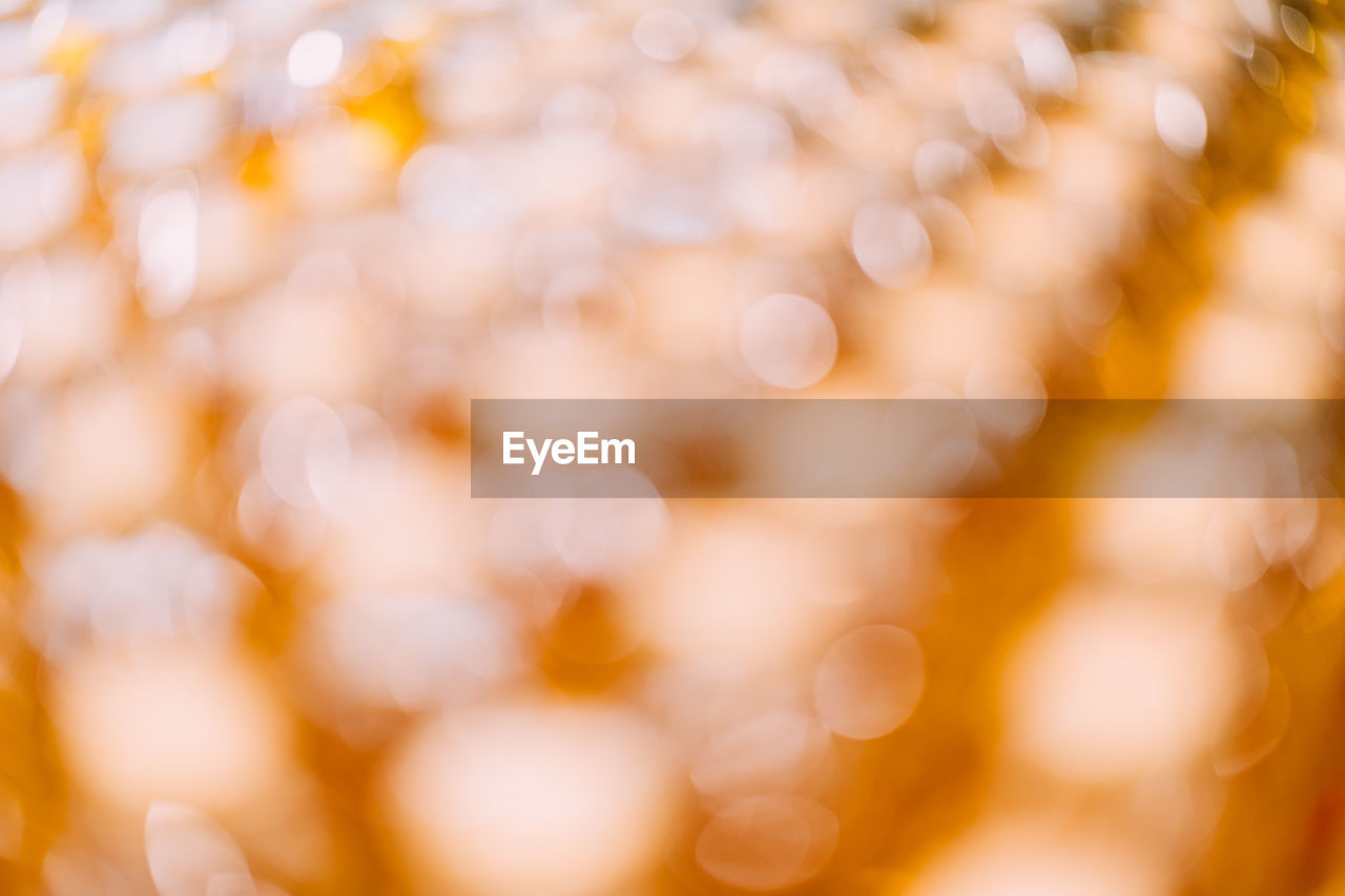 FULL FRAME SHOT OF DEFOCUSED LIGHTS