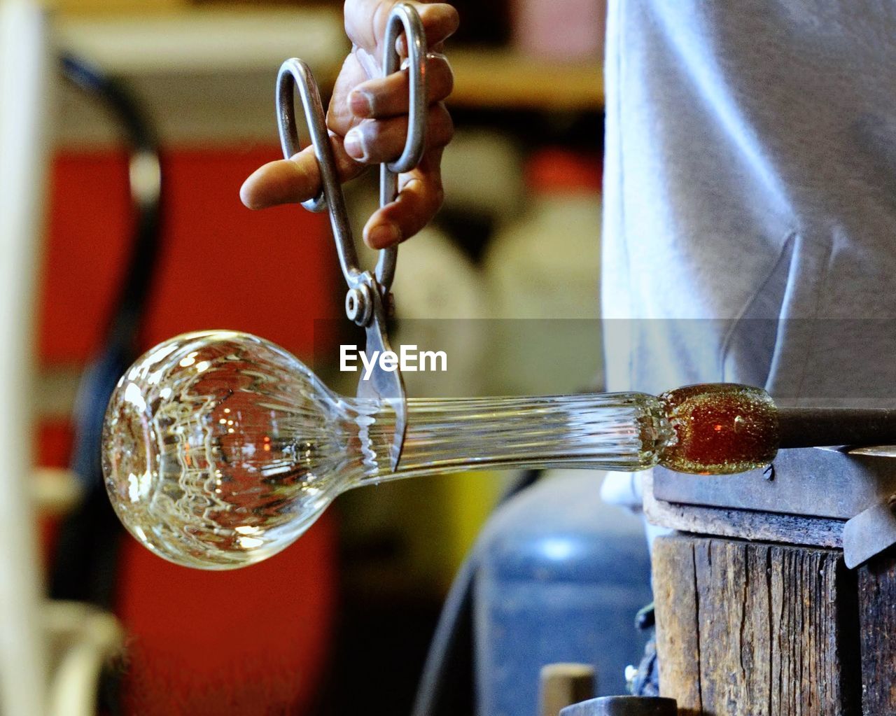 Close-up of hand pouring water