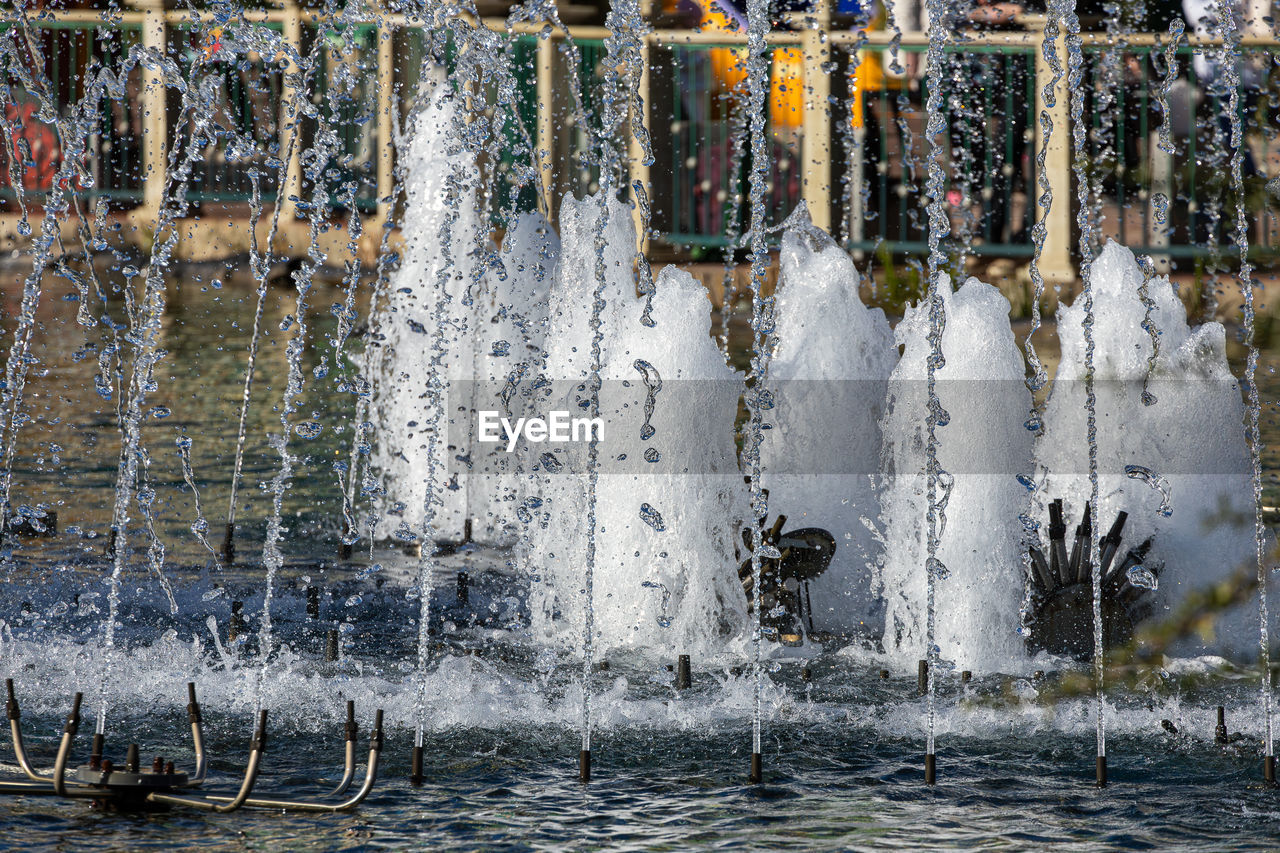 water, winter, ice, no people, water feature, nature, waterfall, fountain, day, reflection, splashing, outdoors, architecture, motion, built structure